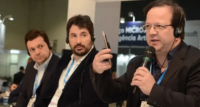 Three participants discuss technology in municipality 